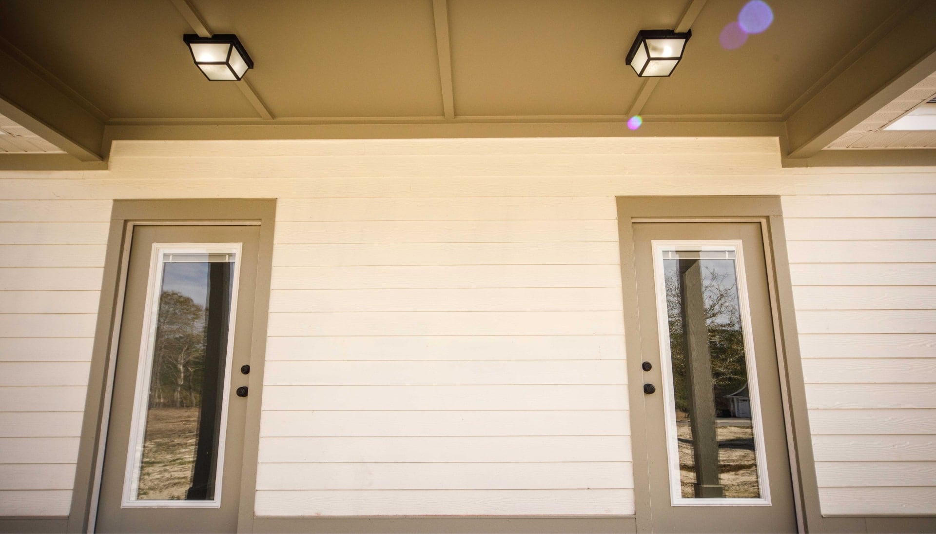 We offer siding services in Tulsa, Oklahoma. Hardie plank siding installation in a front entry way.